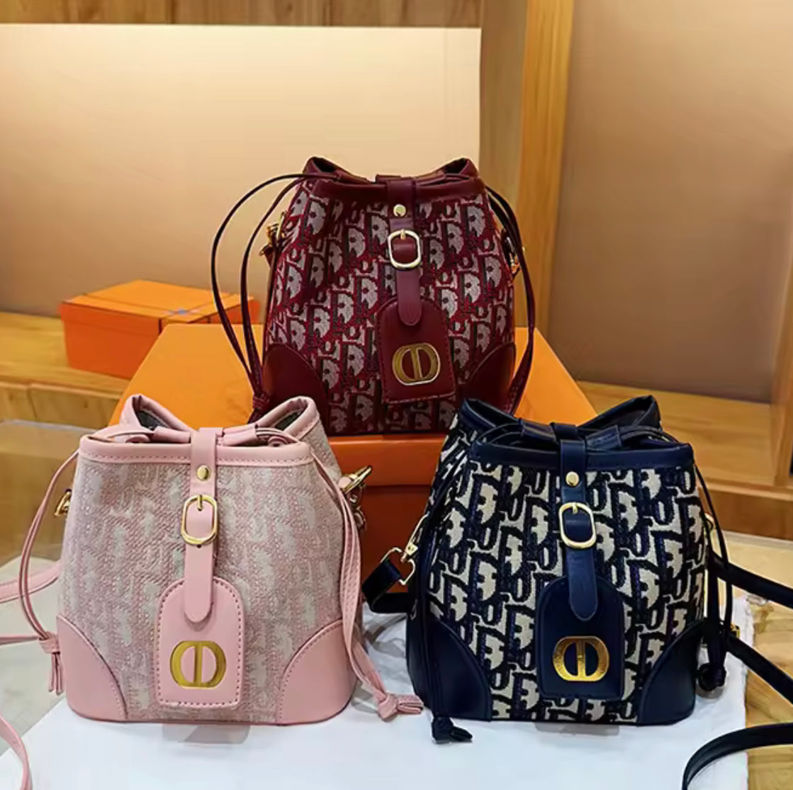 CD inspired cross body bag